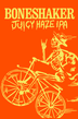 Boneshaker Juicy Haze IPA label with skeleton on a bicycle against an orange background
